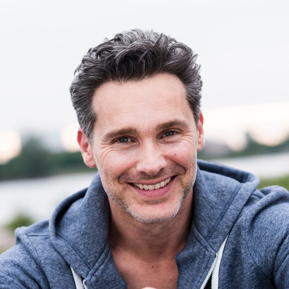 portrait of smiling man at the riverside b6w5ehb 1 2 1.jpg